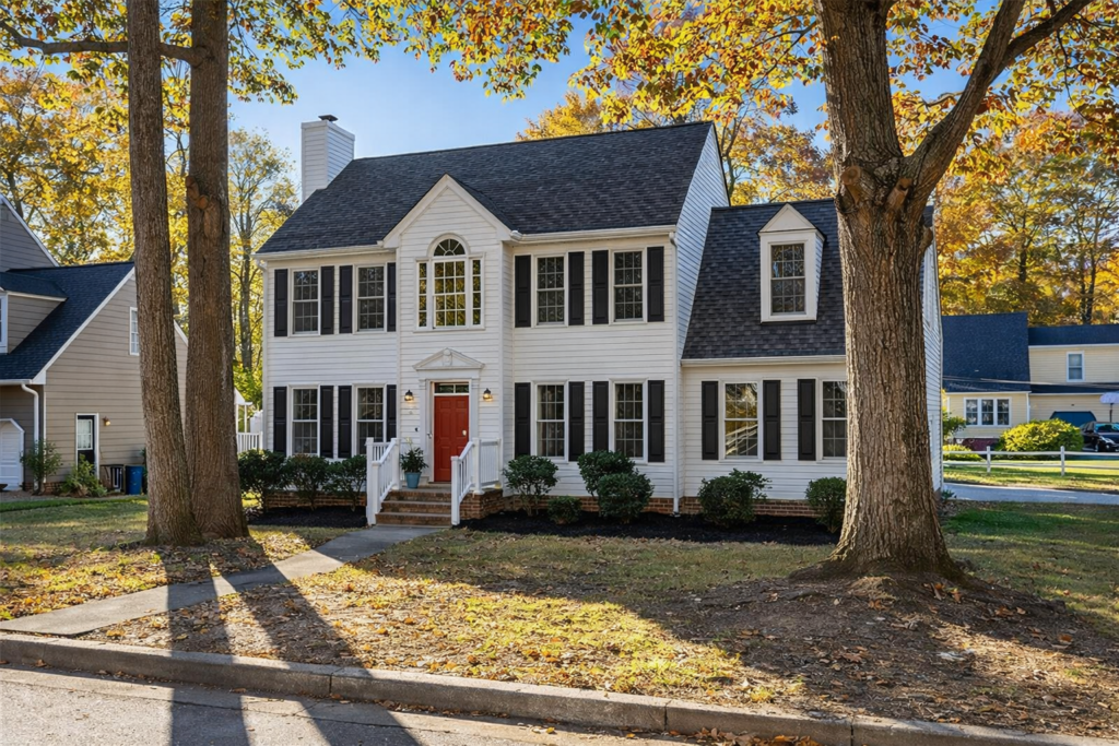 Richmond soft wash brightens clean gutters on suburban home